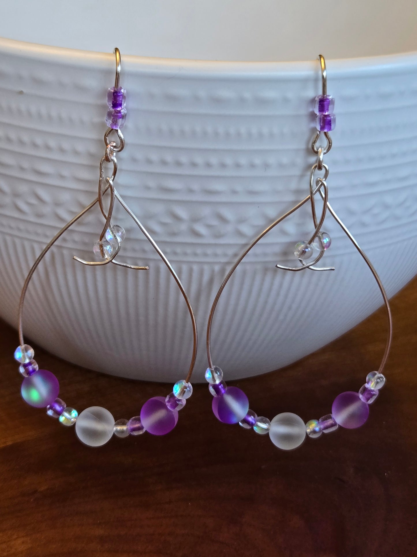 Silver wire teardrop earrings with Rainbow/Purple glass beads