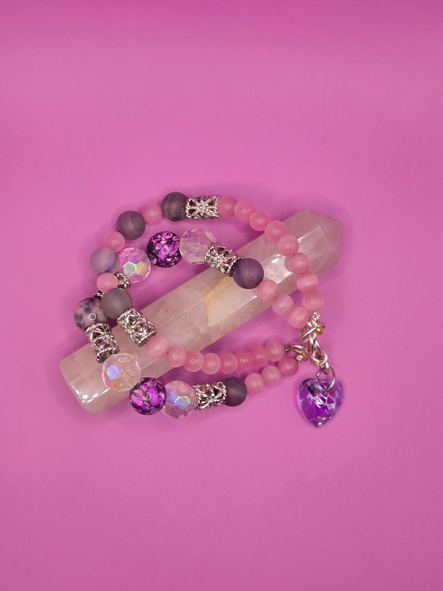 Double bracelet with variety glass beads and a glass heart charm