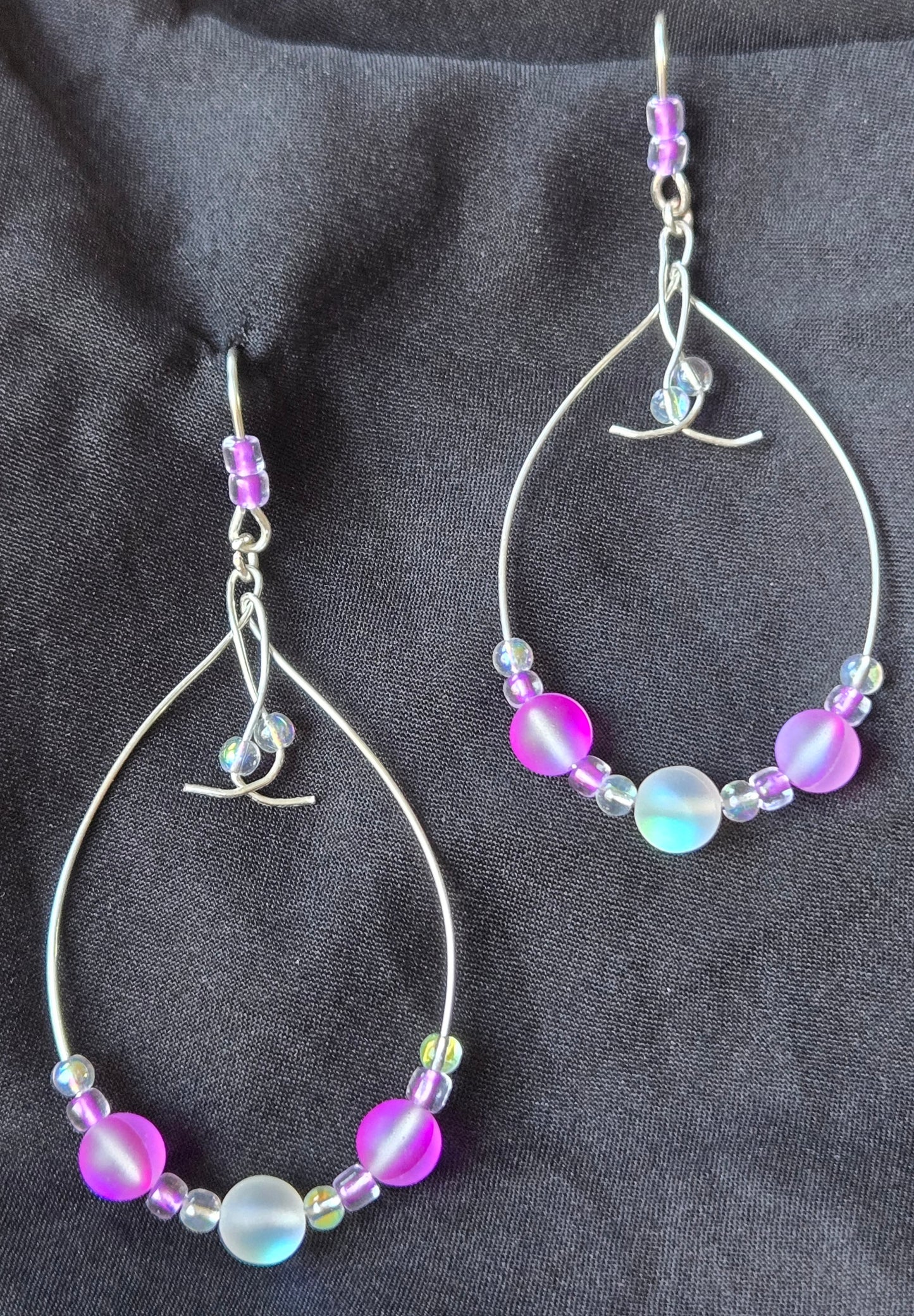 Silver wire teardrop earrings with Rainbow/Purple glass beads