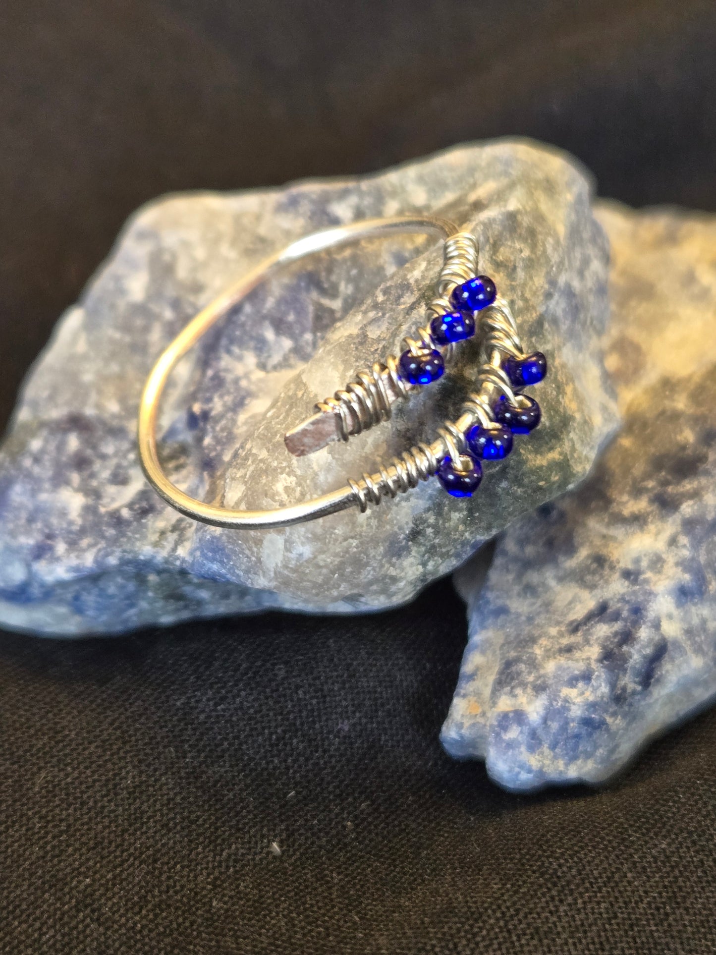 Adjustable Silver Bypass ring with Deep Blue glass seed beads