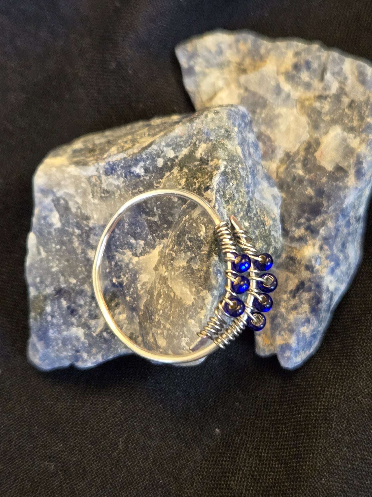 Adjustable Silver Bypass ring with Deep Blue glass seed beads