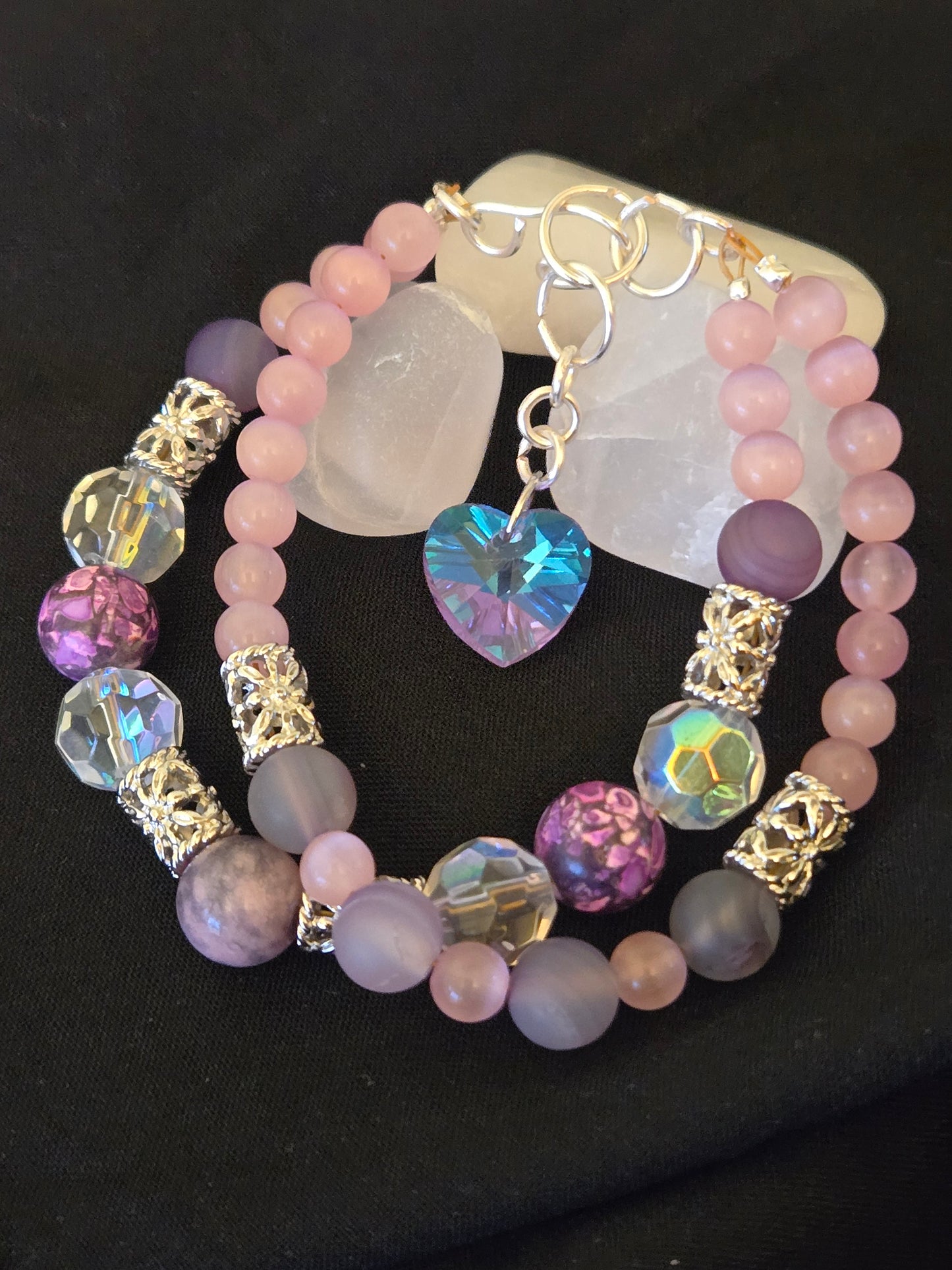 Double bracelet with variety glass beads and a glass heart charm