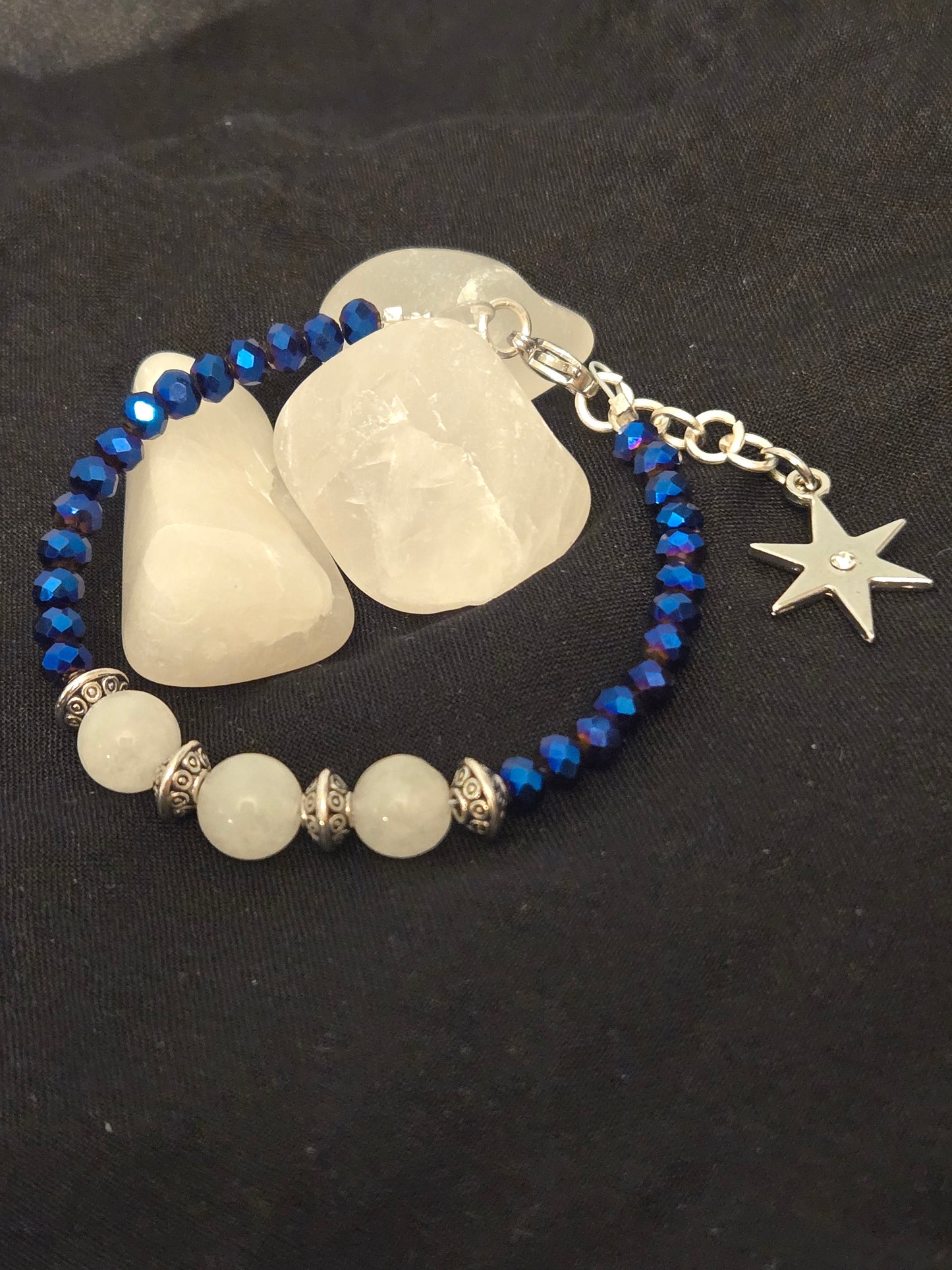 Satin wire bracelet with small Blue faceted glass beads and silver star charm