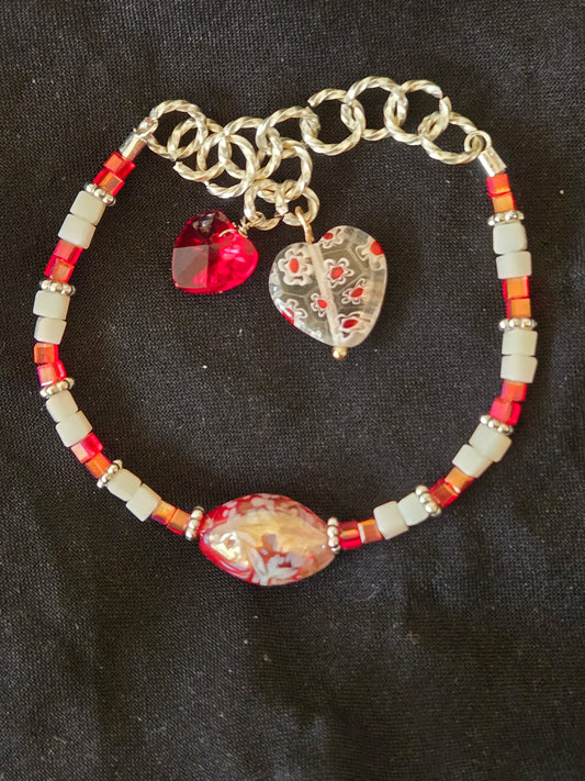 Lampwork glass red marbled bead stretch bracelet with red/white glass beads and glass heart charms