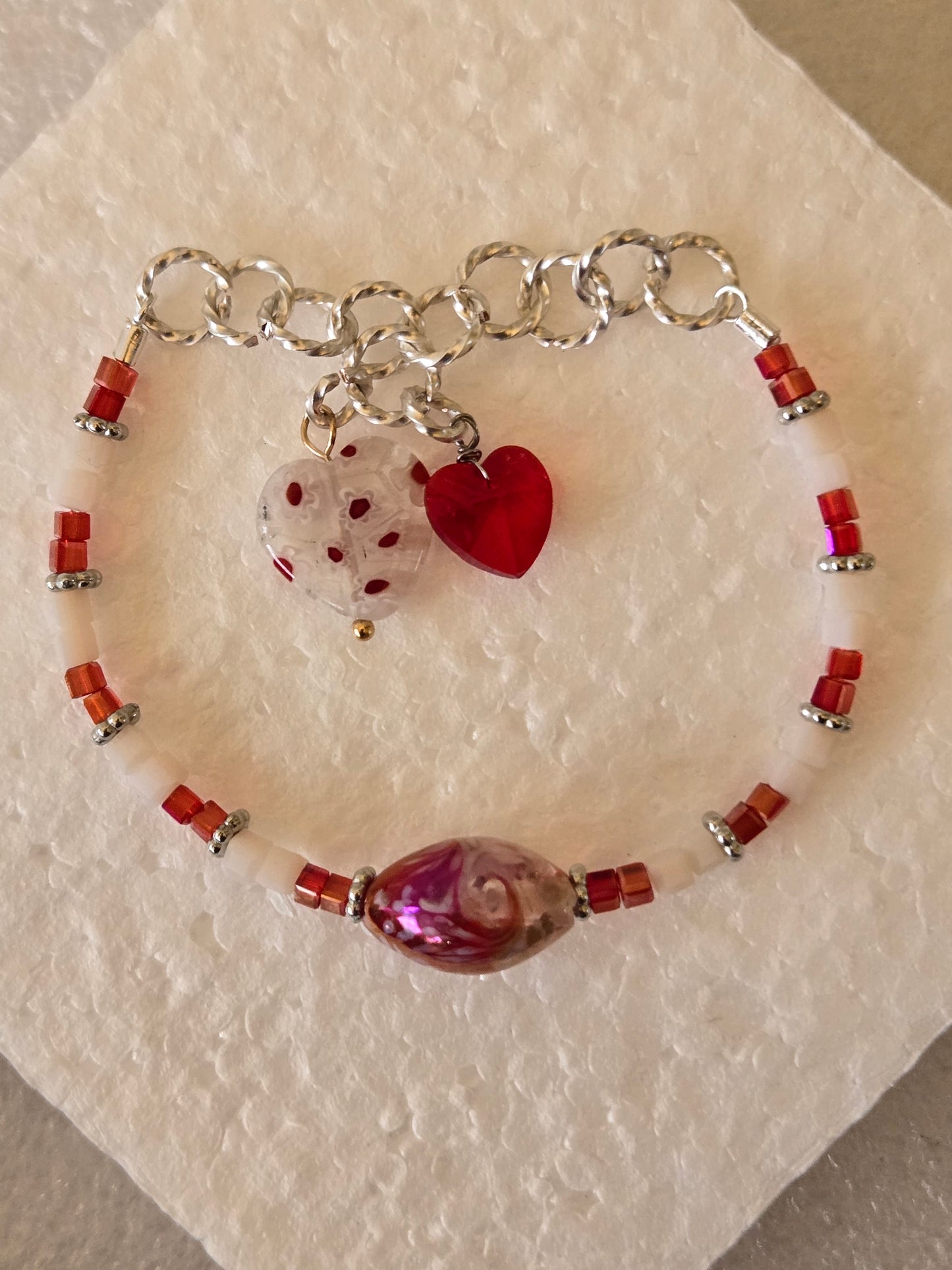 Lampwork glass red marbled bead stretch bracelet with red/white glass beads and glass heart charms