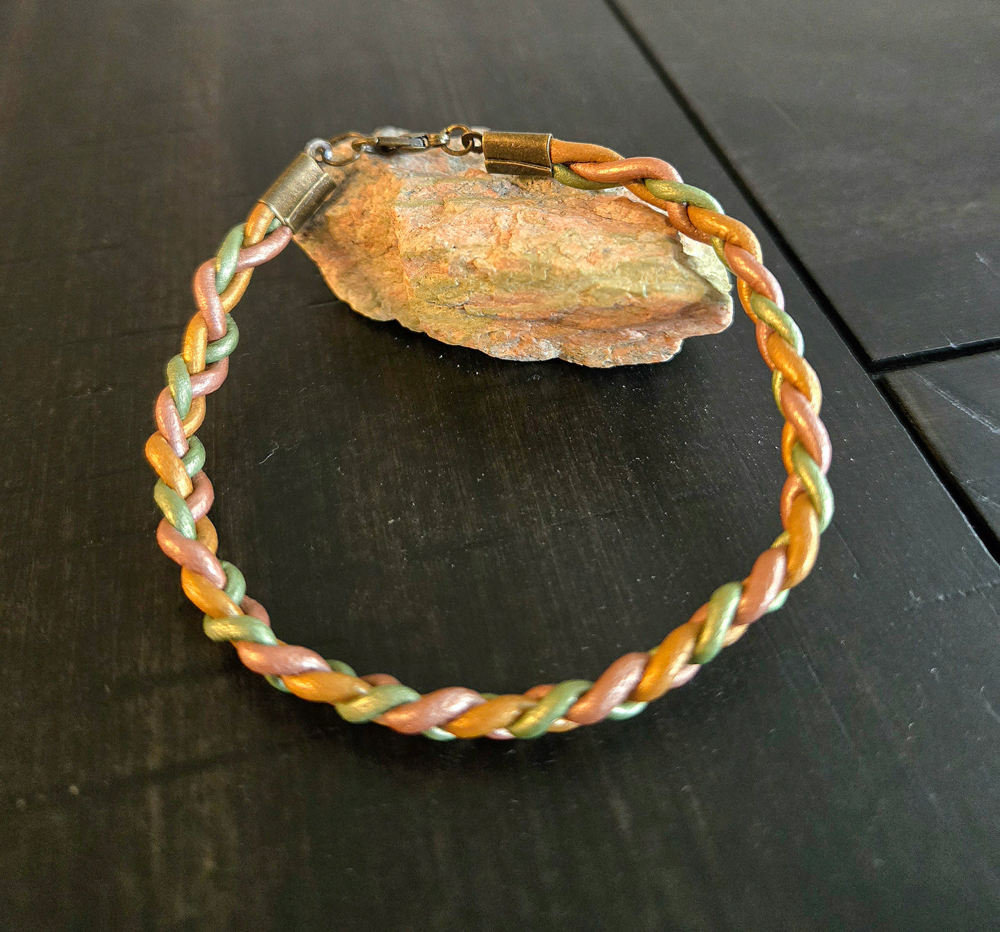 Gold/copper/green braided leather bracelet