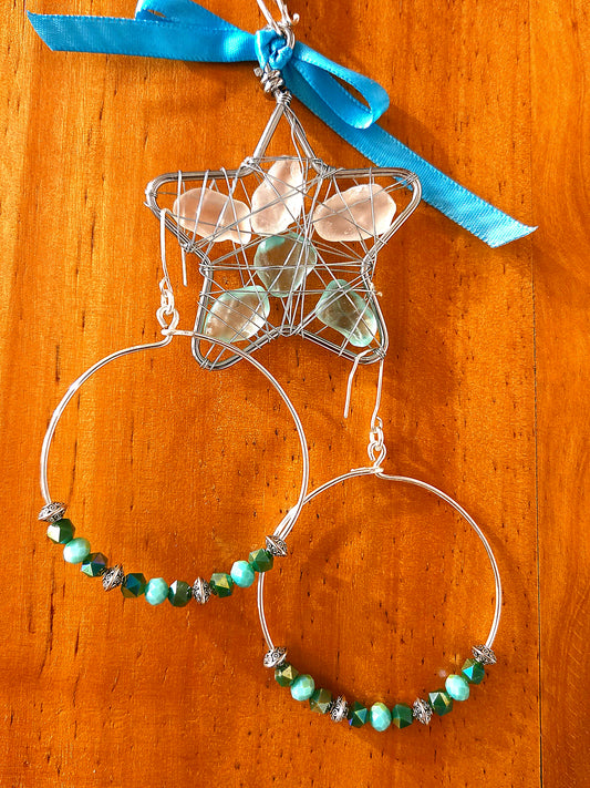 Large hoop earrings with crystal and glass beads