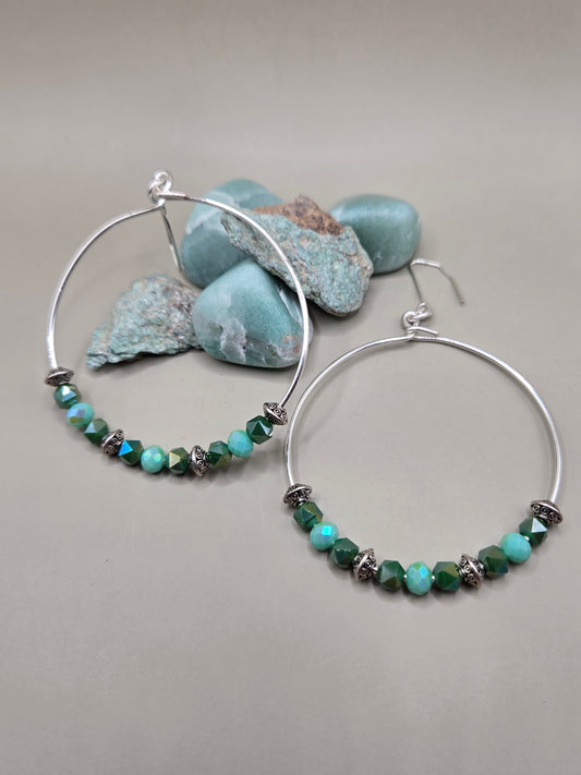 Large hoop earrings with crystal and glass beads