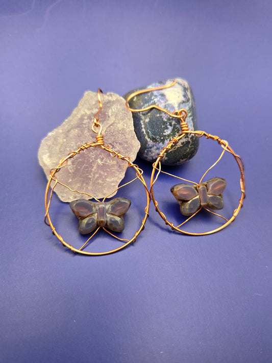 Copper wire wrapped purple butterfly glass hoop earrings