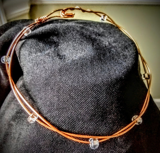 Copper wire bracelet with clear glass seed beads