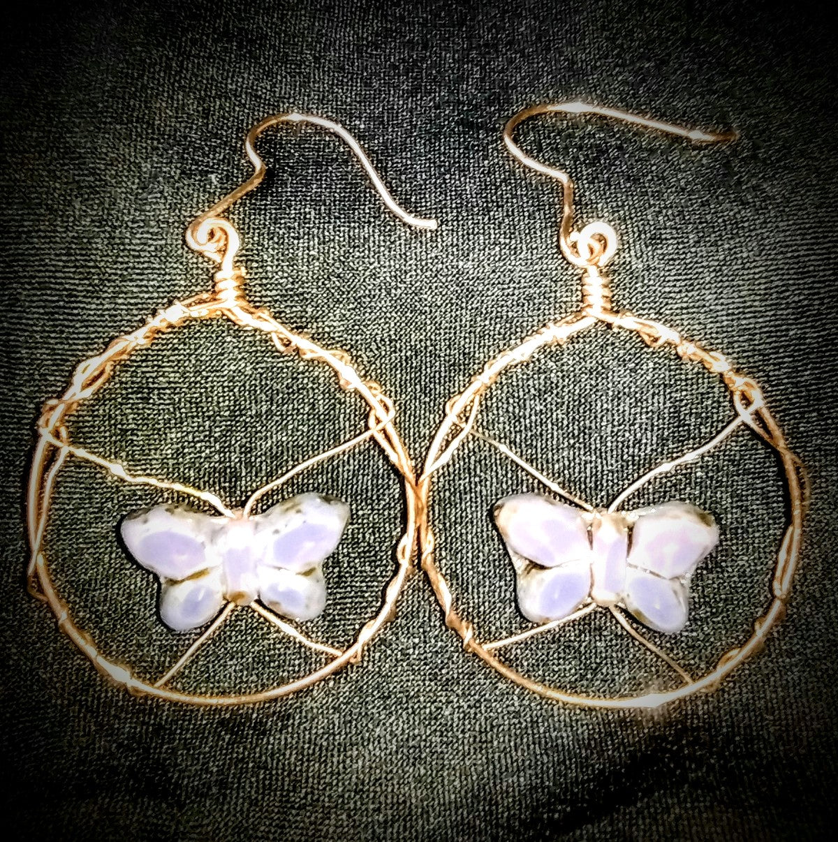 Copper wire wrapped purple butterfly glass hoop earrings