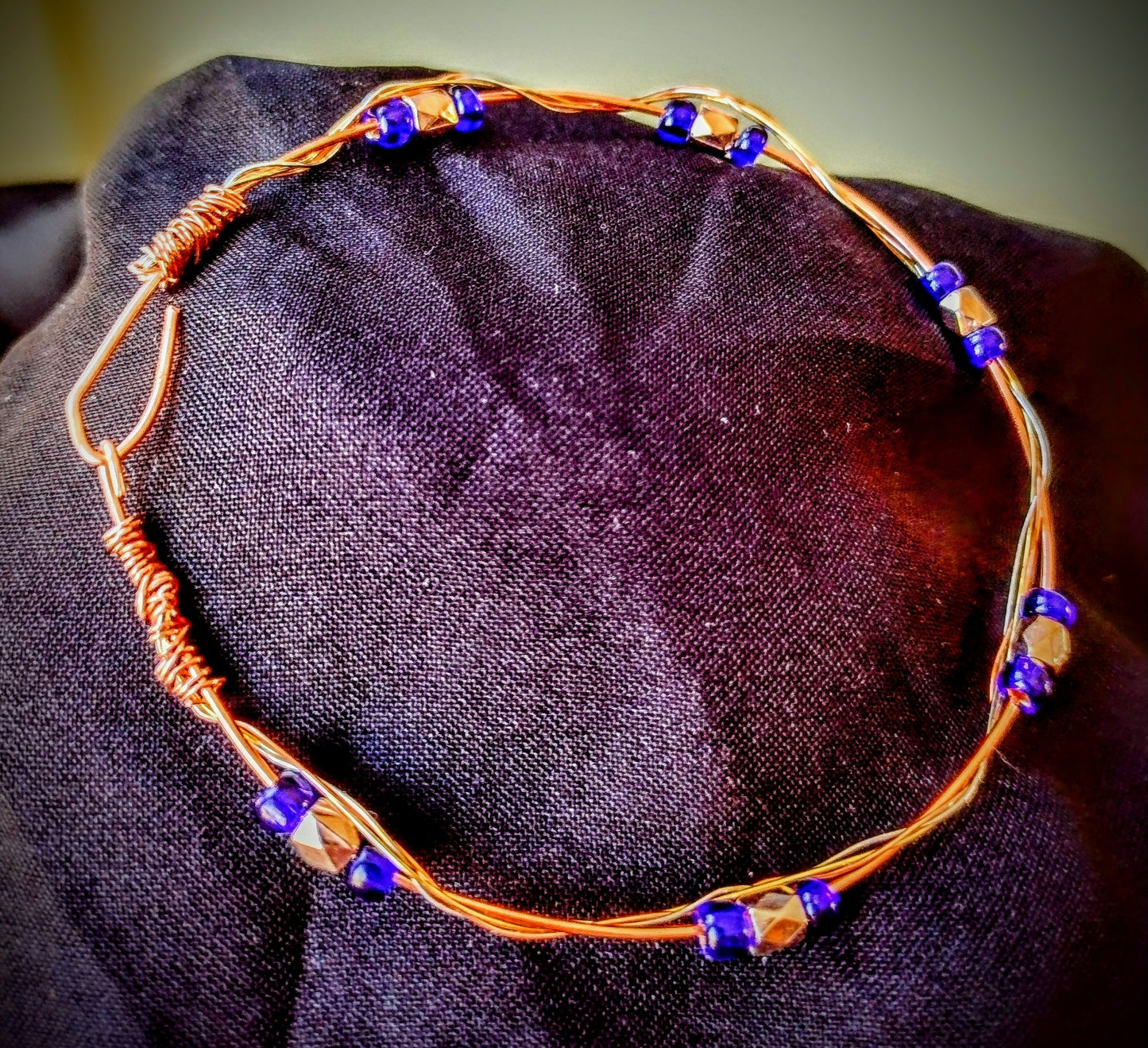 Copper wire bracelet with twisted silver/brass wire and Blue glass seed beads