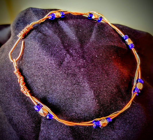 Copper wire bracelet with twisted silver/brass wire and Blue glass seed beads