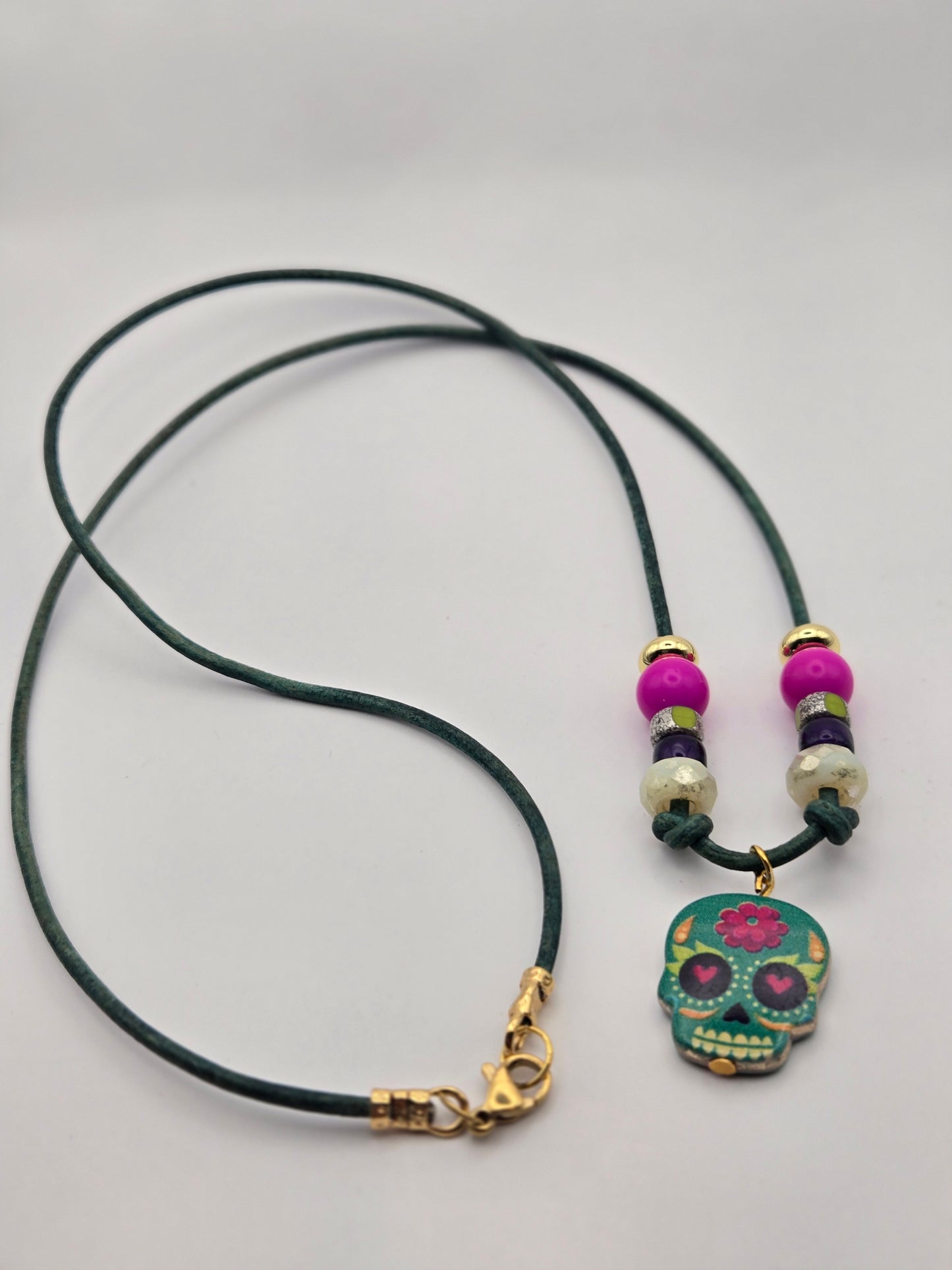 Gold metal colorful skull leather cord necklace
