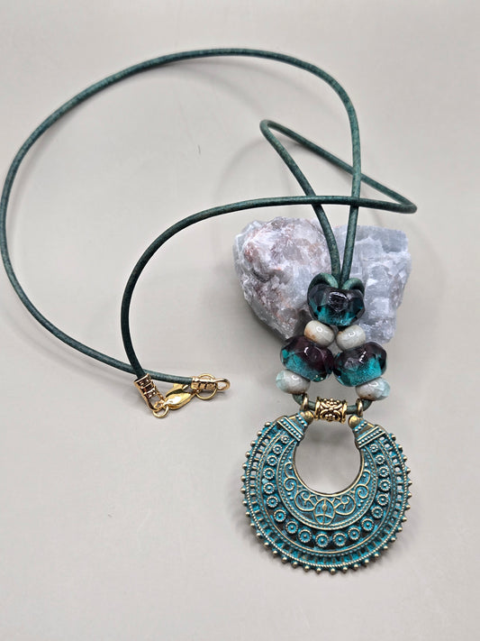 Patina focal leather pendant